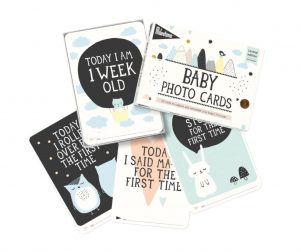 Milestone Over-the-Moon baby photo cards, featuring cute forest animals and printed milestones for babies (like "I Am One Week Old"). Photo courtesy of Milestone.